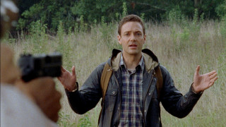 Man holding gun field tall - tall grass and trees free wallpaper
