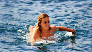 Woman bikini swimming ocean arm - the side of the water free wallpaper