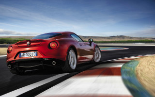 Red sports car driving race - bernardo cavallino free wallpaper