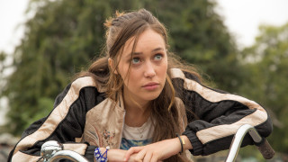 Woman bike concerned look camera - her face and shoulders free wallpaper