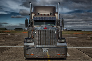 Semi truck runway cloudy sky - a semi truck free wallpaper