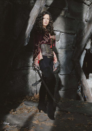 Woman costume sword dog cave - a stone wall free wallpaper