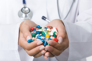 Doctor holding pills stethoscope white - neoplasticism free wallpaper