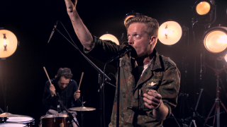 Military man singing microphone drums - another man free wallpaper