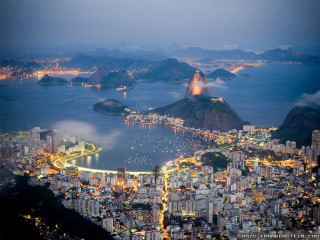City night water mountains lit - a matte painting free wallpaper for desktop