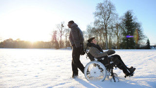 Man wheelchair snow woman black - a black jacket free wallpaper