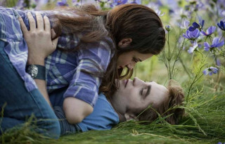 Woman laying flower field neo - movie still free wallpaper