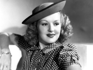 Woman hat polka dot shirt - head and shoulders portrait free wallpaper