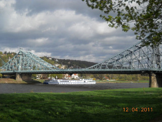 Large boat under bridge river - a bridge free wallpaper