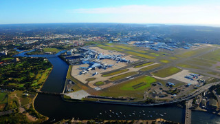 Aerial airport river bridge runway - an aerial view free wallpaper