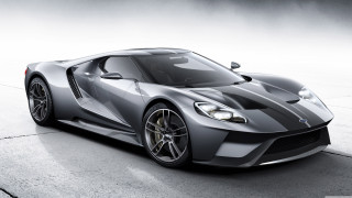 Silver sports car foggy black - a concrete surface free wallpaper