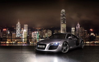 Silver sports car city skyline 2 - a silver sports car free wallpaper for desktop