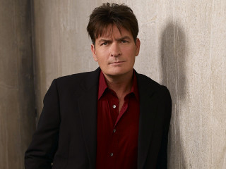 Man leaning wall black jacket - a man leaning against a wall free wallpaper