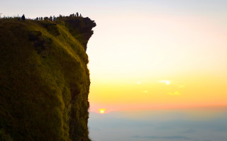 Cliff grassy sunset people top - a few person free wallpaper