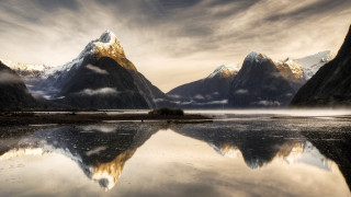 Mountain range lake trees cloudy 3 - a cloudy sky above free wallpaper