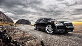Black car rocky road mountain - dramatic free wallpaper