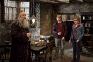 Group people table food stonewalls - movie still free wallpaper