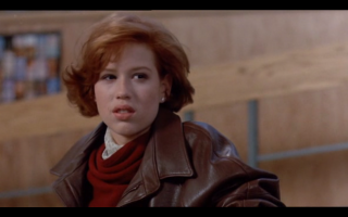Woman brown jacket red sweater - twin peak free wallpaper