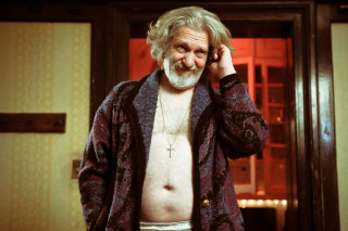 Man beard no shirt cellphone - a cell phone in a room free wallpaper