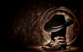 Cowboy hat boots table wooden - a table in front free wallpaper