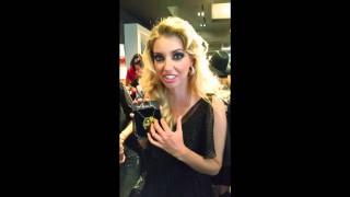 Woman black dress cell phone 3 - a black dress holding free wallpaper