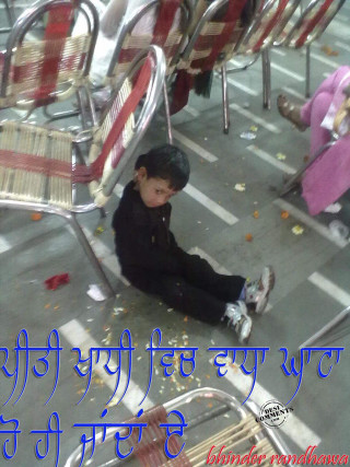 Young boy sitting ground pile - the ground next free wallpaper
