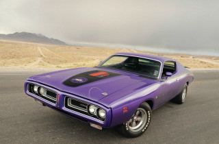 Purple car parked road mountain - the side of a road near a mountain range free wallpaper