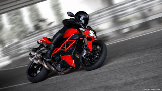 Red motorcycle driving street blurry - duccio free wallpaper