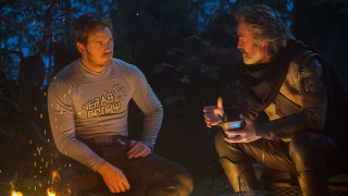 Campfire men drinks cellphone sitting - daryush shokof free wallpaper