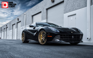 Black sports car red door 2 - a white wall behind free wallpaper