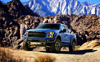 Blue truck dirt road mountains - a blue truck free wallpaper