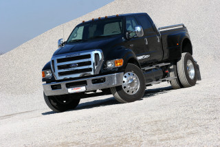 Black truck parked hill desert - dennis flanders free wallpaper
