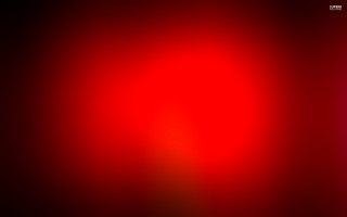 Red black background red light - a red light in the middle of the image free wallpaper