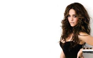 Woman black dress laptop posing - a black dress holding free wallpaper