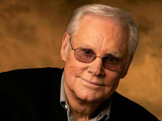 Man glasses smiling studio brown - david garner free wallpaper