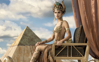 Woman costume chair pyramid afrofuturism - a chair in front free wallpaper