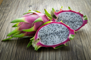 Dragon fruit cut wooden table - a wooden table top free wallpaper