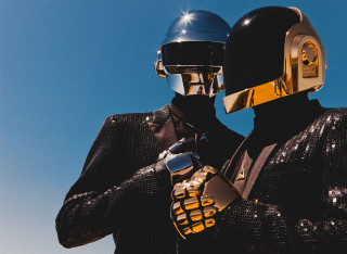 Afrofuturism man in gold suit - a black suit free wallpaper
