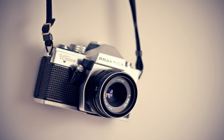 Camera hanging cord wall attached - photographic free wallpaper