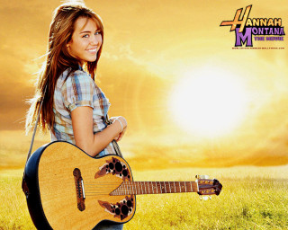Girl holding guitar field grass - fanny mcian free wallpaper