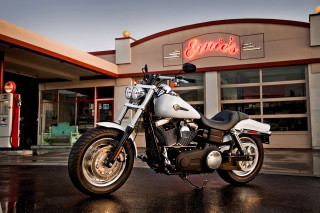 Motorcycle parked building neon sign 4 - feature free wallpaper
