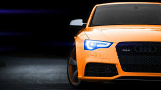 Orange car black background white 3 - an orange car free wallpaper
