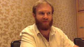 Man beard chair remote cellphone - mitchell mohrhauser free wallpaper