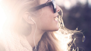 Woman earbuds sunglasses smiling looking - looking free wallpaper