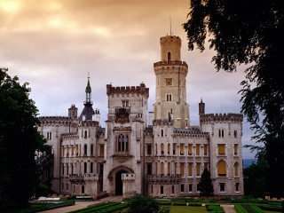 Castle clocktower garden cloudy sky - a castle free wallpaper