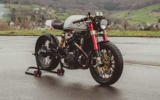 Motorcycle parked wet road mountain - wet free wallpaper