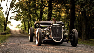 Vintage car woods road person - dieselpunk free wallpaper