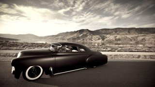Classic car desert mountains lake - the background and a lake in the foreground free wallpaper