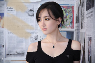 Woman black top wall newspapers - a black top free wallpaper