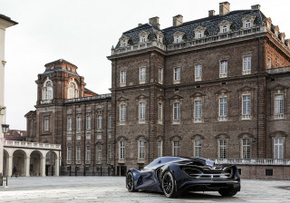 Black sports car cityscape clock - roof free wallpaper